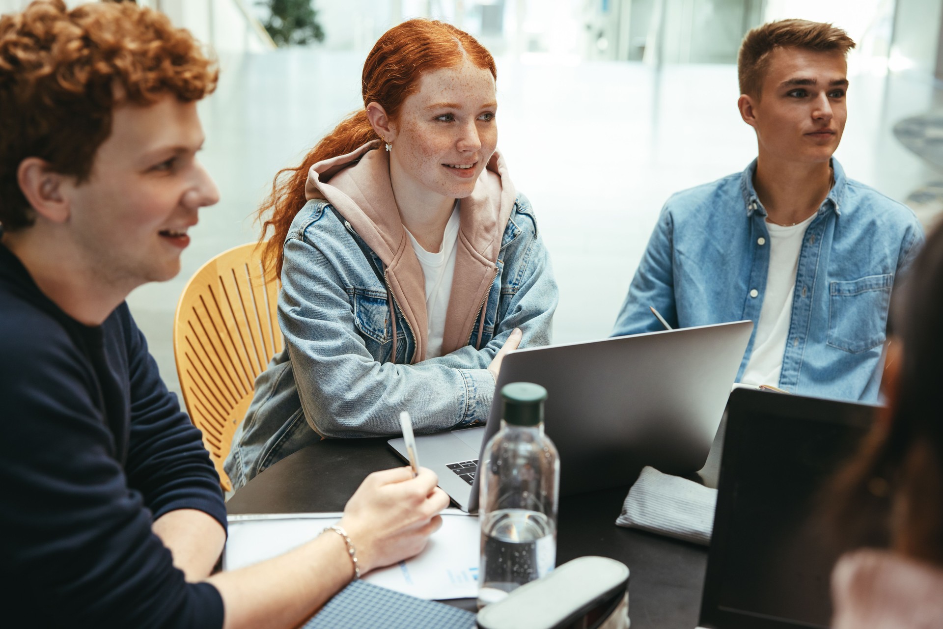 Group of friends working on a college assignment